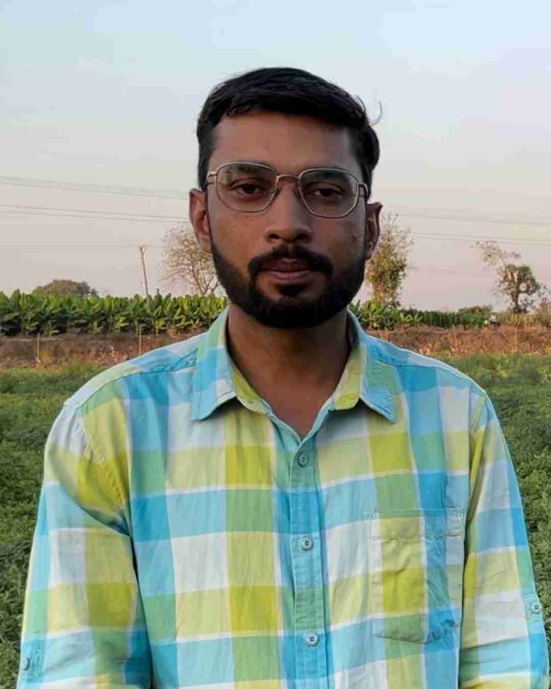 Portrait of Fyllo customer farmer showing crop yield success